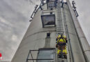 D: Feuerwehr in Grevenbroich löscht zeitgleich Wohnungsbrand und Feuer in Silo